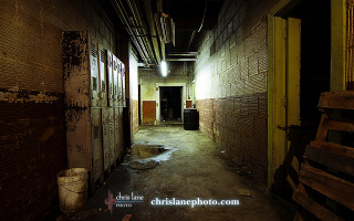 Dark hallway bench trashcan corner - a trash free wallpaper