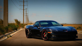 Black sports car power pole - a black sports car free wallpaper