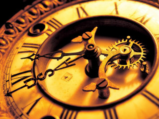 Close up gold clock face - kinetic free wallpaper