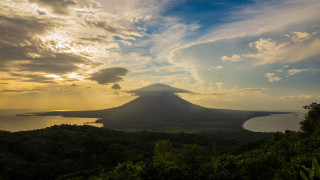 Volcano lake mountain water distant - a lake below free wallpaper