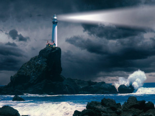 Lighthouse rock light beam ocean - a light beam free wallpaper