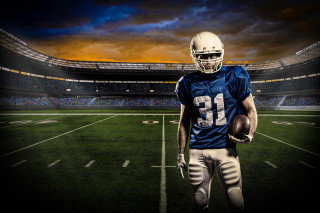 Football player night stadium dramatic - a stadium in the background free wallpaper