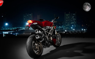 Red motorcycle city night moon 2 - the moon in the background free wallpaper