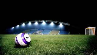 Soccer ball lush green field 3 - a lush green field free wallpaper