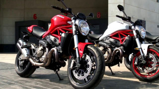 Motorcycles parked street building door - mannerism free wallpaper