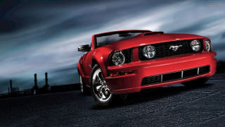 Red mustang car night cloudy - a cloudy sky behind free wallpaper