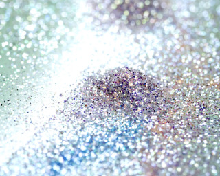 Glitter closeup blurry background white - particle free wallpaper