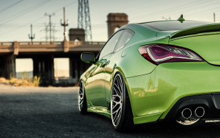 Green sports car parking lot 3 - a green sports car free wallpaper