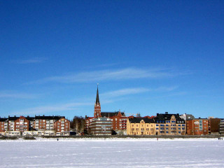 Snowy building clock tower cityscape - a large building free wallpaper