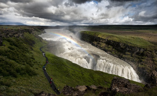 Rainbow waterfall field people standing - a rainbow free wallpaper