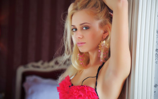 Woman pink dress leaning wall - fashion photoshoot free wallpaper