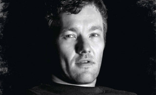 Man black jersey serious look - peter konig free wallpaper