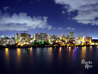 City skyline night water cloudy - a body of water in front free wallpaper