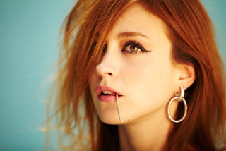 Woman nose piercing serious look - a nose free wallpaper