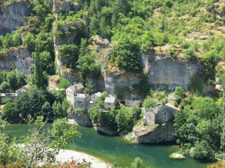 River lush forest hillside cliff - free landscape wallpaper