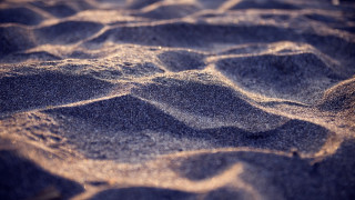 Sandy beach small waves blurry - sandy free wallpaper