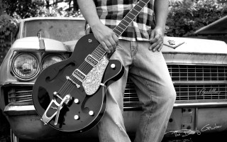 Man guitar car grass trees - a car in the background free wallpaper