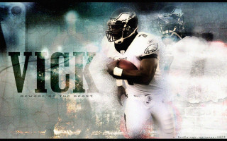 Football player holding football background - eric taylor free wallpaper