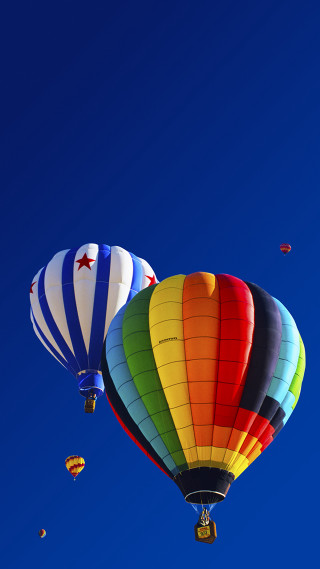 Hot air balloons blue sky 6 - a blue sky background free wallpaper for mobile