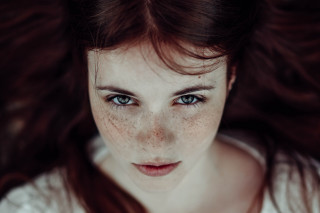 Woman freckles hair camera looking - freckle free wallpaper