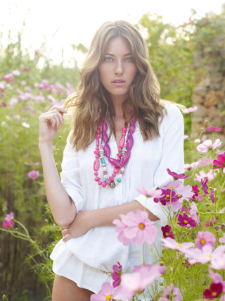 Woman standing field flowers arms - a field of flowers free wallpaper for mobile
