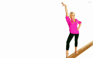 Woman pink shirt balancing arabesque - a pink shirt free wallpaper
