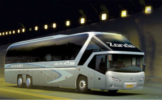 Bus parked nighttime lights black - a bus free wallpaper