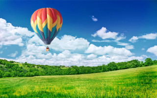 Hot air balloon green field - a hot air balloon free wallpaper