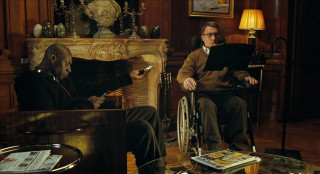 Man wheelchair talking living room - eric de kolb free wallpaper