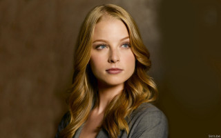 Woman longhair blueeyes darkroom brownwall - a brown wall free wallpaper