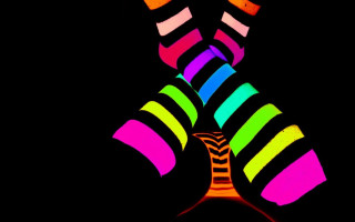 Colorful person feet up legs - fluorescent free wallpaper