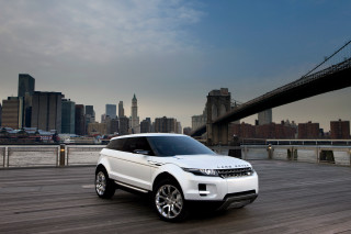 White range rover city skyline - a bridge in the background free wallpaper