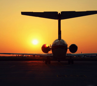 Plane sunset runway orange sky - free airplane wallpaper for tablet