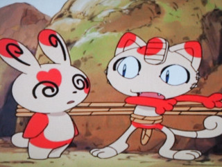 Cartoon rabbits holding stick mountain - a sky in the background free wallpaper