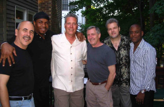 Men group house trees background - studio photo free wallpaper