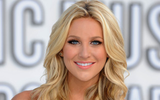 Blonde hair blue eyes smiling 7 - a silver background free wallpaper