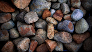 Pile rocks black background blue - a pile of rocks free wallpaper