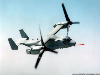 Propeller plane flying blue sky 4 - side and a propeller free wallpaper