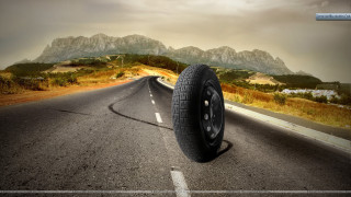 Tire side road mountains cloudy - a tire free wallpaper