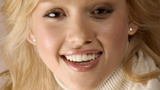 Smiling woman pearl necklace white - a white sweater free wallpaper