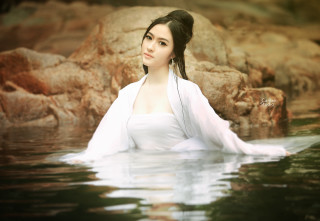 Woman white dress water rocks - chen lin free wallpaper