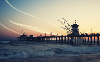 Pier clocktower sunset water contrails - carl hoppe free wallpaper for desktop