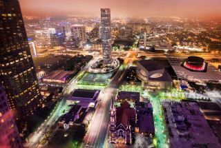 City night lights clock tower - a clock tower in the distance free wallpaper