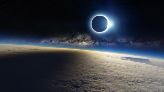 Solar eclipse earth horizon view - a solar eclipse free wallpaper