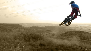 Man flying bike dirt road 2 - a bike free wallpaper