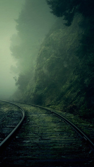 Train track foggy mountain trees - a train track free wallpaper for mobile