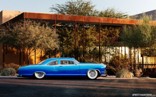 Blue car parked building tree - don eddy free wallpaper