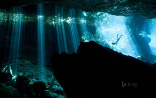 Cave waterfall person swimming sunlight - amazing depth free wallpaper