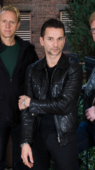 Men group standing building clock 2 - a group of men free wallpaper for mobile