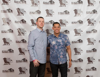 Two men animal rescuers wall - andrew law free wallpaper